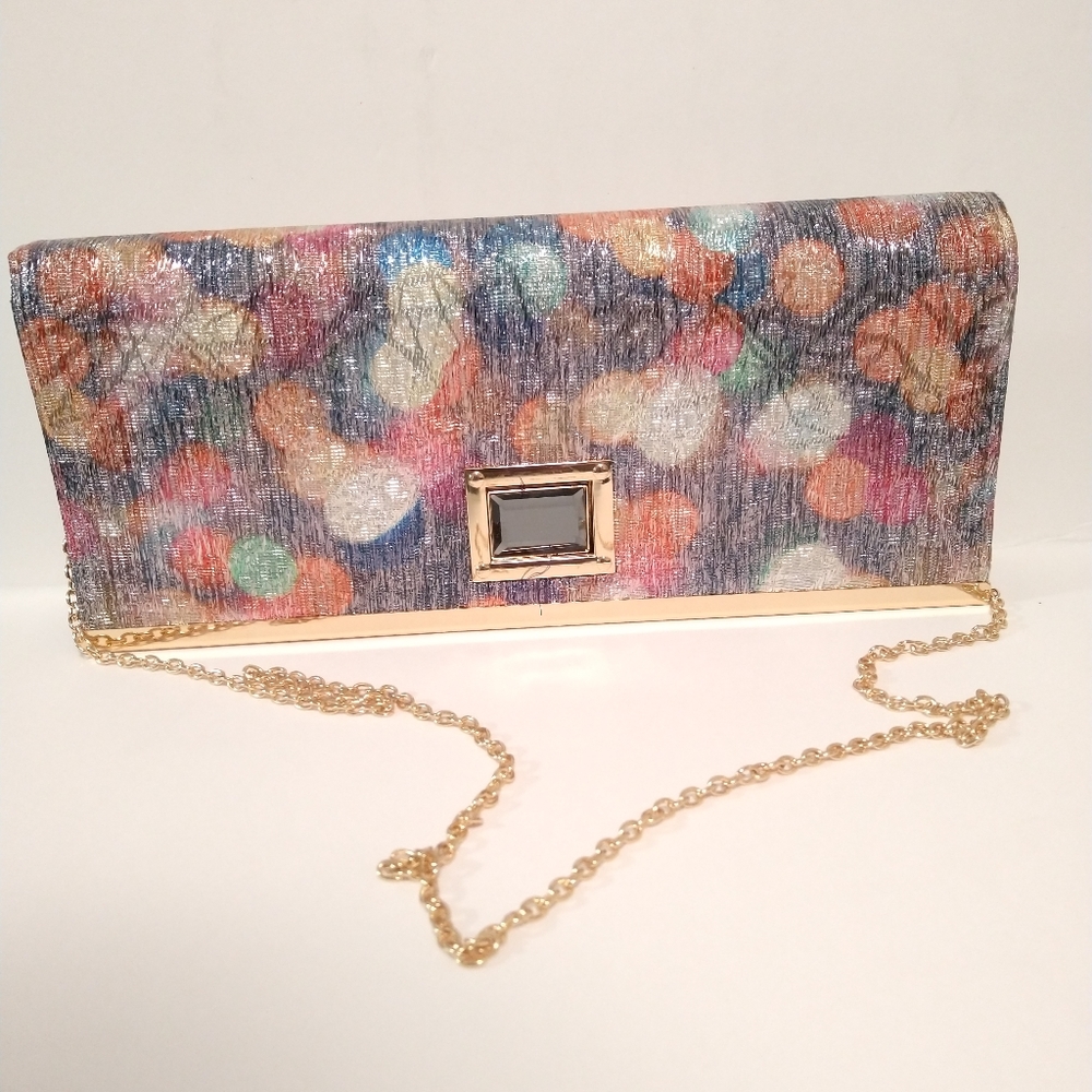 Clutch purse, multi color, shoulder chain strap. great condition W 13 in W 5 1/2